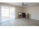 Spacious bedroom with sliding door access to backyard and hardwood floors at 8651 N 56Th Dr, Glendale, AZ 85302