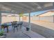 Covered patio with table and chairs, perfect for outdoor dining at 8651 N 56Th Dr, Glendale, AZ 85302