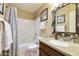 Clean bathroom with shower/tub combo and updated vanity at 9521 E Rocky Lake Dr, Sun Lakes, AZ 85248