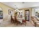 Formal dining room with chandelier and decorative place settings at 9521 E Rocky Lake Dr, Sun Lakes, AZ 85248