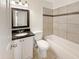 Clean bathroom with granite vanity and shower/tub combo at 1013 W Angela Dr, Phoenix, AZ 85023