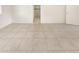 Bedroom with tile floors and access to bathroom at 1013 W Angela Dr, Phoenix, AZ 85023