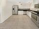 Open kitchen with stainless steel appliances and ample counter space at 1013 W Angela Dr, Phoenix, AZ 85023