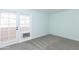 Bedroom with door to balcony and window coverings at 1425 E Desert Cove Ave # 32, Phoenix, AZ 85020