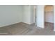 Bright bedroom with carpet flooring and spacious closet at 1425 E Desert Cove Ave # 32, Phoenix, AZ 85020