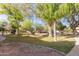 Landscaped community park with mature trees and grassy areas at 1425 E Desert Cove Ave # 32, Phoenix, AZ 85020