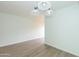 Simple dining room with hardwood floors and light walls at 1425 E Desert Cove Ave # 32, Phoenix, AZ 85020
