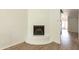 Cozy corner fireplace with white surround in living room at 1425 E Desert Cove Ave # 32, Phoenix, AZ 85020