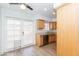 Modern kitchen with stainless steel dishwasher and light wood cabinets at 1425 E Desert Cove Ave # 32, Phoenix, AZ 85020