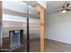 Stainless steel refrigerator in modern kitchen with wood cabinets at 1425 E Desert Cove Ave # 32, Phoenix, AZ 85020