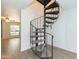 Modern spiral staircase in a bright open space at 1425 E Desert Cove Ave # 32, Phoenix, AZ 85020