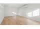 Bright, clean room with wood floors and minimal decor at 1930 E Rancho Dr, Phoenix, AZ 85016