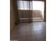 Sliding glass door that leads to a patio or balcony at 1942 S Emerson -- # 222, Mesa, AZ 85210