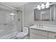 Clean bathroom with a walk-in shower, white vanity, and gray tile at 2002 N 87Th Ter, Scottsdale, AZ 85257