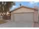 Attached garage with a spacious driveway at 2002 N 87Th Ter, Scottsdale, AZ 85257