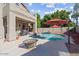 Inviting backyard oasis with a sparkling pool at 21625 N 59Th Dr, Glendale, AZ 85308