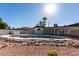 Stunning kidney-shaped pool with rock accents at 2364 W Emelita Ave, Mesa, AZ 85202