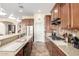 Well-equipped kitchen with ample counter space and wooden cabinetry at 2512 W Corral Rd, Phoenix, AZ 85041