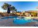 Relaxing pool area with ample lounge chairs and patio space at 2512 W Corral Rd, Phoenix, AZ 85041