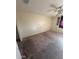 Spacious bedroom with ceiling fan and carpet at 25724 W St James Ave, Buckeye, AZ 85326