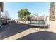 Large backyard with trampoline and covered patio at 2832 E Laurel St, Mesa, AZ 85213