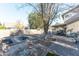 Large backyard with garden, patio, and play area at 2832 E Laurel St, Mesa, AZ 85213