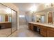 Large bathroom with double sinks and a walk-in shower at 2832 E Laurel St, Mesa, AZ 85213