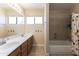 Bathroom with double sinks and a bathtub at 2832 E Laurel St, Mesa, AZ 85213