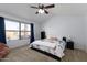 Spacious bedroom with large windows and ceiling fan at 2832 E Laurel St, Mesa, AZ 85213