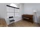 Small office space with a piano and large window at 2832 E Laurel St, Mesa, AZ 85213