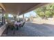 Covered patio with seating area and string lights at 2832 E Laurel St, Mesa, AZ 85213