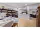 Bright office space with built-in shelving and view to living room at 30276 W Crittenden Ln, Buckeye, AZ 85396