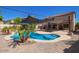 Inviting backyard oasis with a sparkling pool and patio at 30276 W Crittenden Ln, Buckeye, AZ 85396