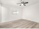 Bright bedroom with hardwood floors and ceiling fan at 620 E Auburn Dr, Tempe, AZ 85283