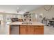 Kitchen island with granite countertop and stainless steel sink at 846 S Stilton Cir, Mesa, AZ 85208