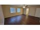 Spacious bedroom with en-suite bathroom and ceiling fan at 9202 W Cambridge Ave, Phoenix, AZ 85037