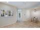 Dining area with modern light fixture and tile flooring at 101 N 7Th St # 159, Phoenix, AZ 85034