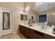 Double vanity bathroom with ample counter space and storage at 10776 W Encanto Blvd, Avondale, AZ 85392