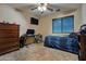 Bedroom with double bed, dresser, and desk at 10776 W Encanto Blvd, Avondale, AZ 85392