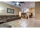 Living area with a sectional sofa and bar at 10776 W Encanto Blvd, Avondale, AZ 85392