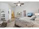 Spacious bedroom with light flooring, a ceiling fan, and a large bed at 1134 E Jahns Dr, Casa Grande, AZ 85122