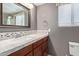 Bathroom with single vanity and window with blinds at 1321 W Clear Spring Dr, Gilbert, AZ 85233