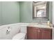 Clean and updated half bathroom with granite vanity at 1321 W Clear Spring Dr, Gilbert, AZ 85233