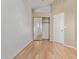 Bedroom with mirrored closet doors and wood flooring at 1321 W Clear Spring Dr, Gilbert, AZ 85233