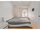 Bedroom with window seat and modern white bed frame at 1321 W Clear Spring Dr, Gilbert, AZ 85233