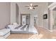 Bright bedroom with sliding door to closet and ensuite bathroom at 1321 W Clear Spring Dr, Gilbert, AZ 85233