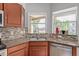 Kitchen with granite countertops, double sink, and views at 1321 W Clear Spring Dr, Gilbert, AZ 85233