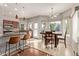 Kitchen boasts granite counters, stainless steel appliances, and breakfast nook at 1321 W Clear Spring Dr, Gilbert, AZ 85233