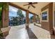 Covered patio with water views and ceiling fan at 1321 W Clear Spring Dr, Gilbert, AZ 85233