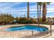 Inviting spa with surrounding stone patio at 1321 W Clear Spring Dr, Gilbert, AZ 85233